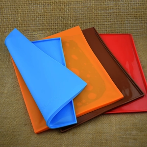 Set of four colorful silicone swiss roll cake mats for baking and heat-resistant use