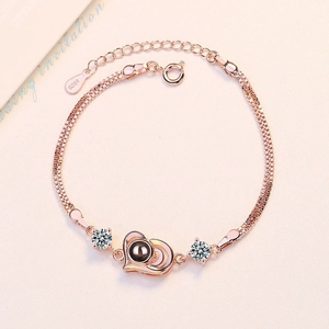 Rose gold double-layer bracelet with heart projection stone and zircon accents