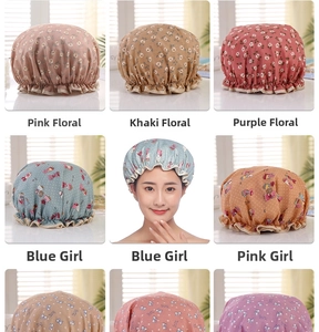 Detail view of waterproof double-layer shower caps with diverse floral and cartoon prints
