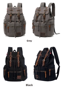 Macro view of grey and black canvas backpacks with vintage leather straps and flap detail