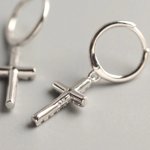 S925 sterling silver huggie earrings featuring a sparkling cross pendant with cubic zirconia