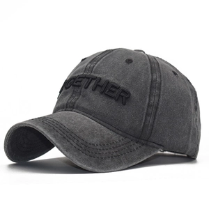 Detailed side view of washed cotton baseball cap with 3D Together embroidery and distressed finish