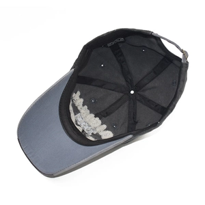 Detailed interior of 100% cotton baseball cap showing black sweatband and embroidery back