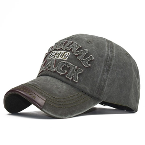 Detailed view of the washed cotton baseball cap with 3D embroidery and leather brim