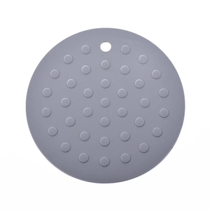 Gray Nordic round silicone placemat with heat-resistant texture and hanging hole
