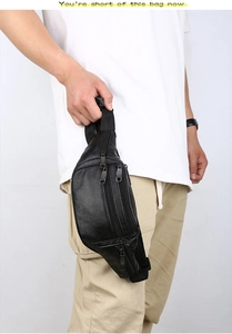 Detail of black waterproof leather fanny pack with multi-zipper layers and adjustable strap