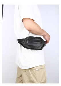 Detail of waterproof black leather fanny pack with multi-layer zipper pockets for men