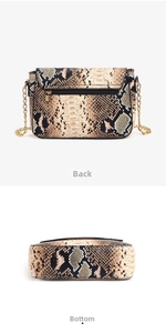 Detail view of the snakeskin crossbody bag back with zipper pocket and flat bottom base