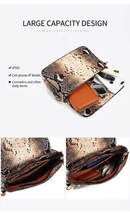 Detailed view of snake pattern crossbody bag showing large capacity with interior compartments