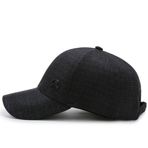 Men's dark charcoal baseball cap with textured cross-pattern fabric and side metal logo