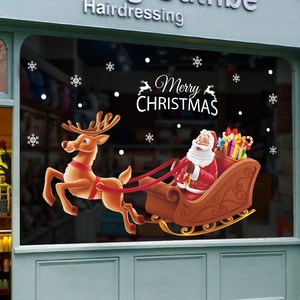 Merry Christmas window decal with Santa Claus and reindeer sleigh for store decoration