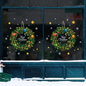 Double-sided Christmas wreath window stickers with pine needles, berries and stars