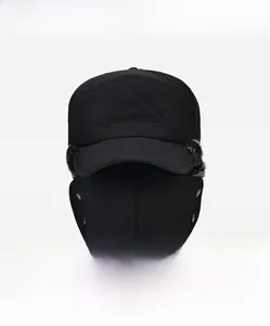 Close-up of winter trapper hat featuring windproof fabric and warm fleece lining
