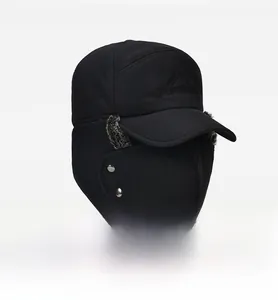 Detail view of winter trapper hat with fleece lining, ear flaps and detachable face mask