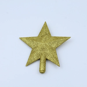 Detail view of a gold glitter star tree topper with a textured surface for Christmas decor