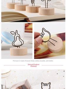 Macro detail of various cute metal wire memo clips on stable natural wood base