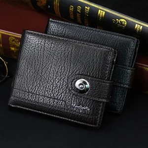 Close-up of litchi grain leather men's wallets in dark coffee and black on vintage books