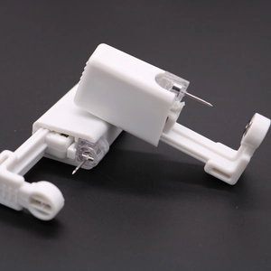 Disposable painless ear piercing gun tool with medical grade steel stud in white
