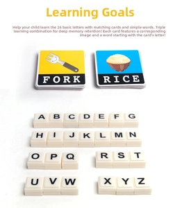 Detail view of colorful alphabet flashcards and 26 white letter blocks for early education