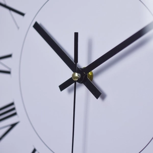 Modern 12-inch stainless steel wall clock with white dial and black Roman numerals