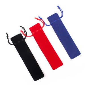 Three velvet drawstring pouches in black, red, and blue for pens and jewelry storage
