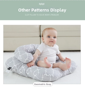 Detail of baby nursing pillow in geometric grey fabric for comfortable sitting support