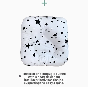 Detail of infant nursing pillow with heart-shaped ergonomic spinal support stitching