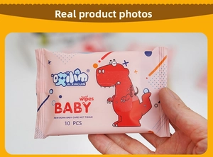 Close-up of portable baby wipes pack with cute pink dinosaur design for newborns