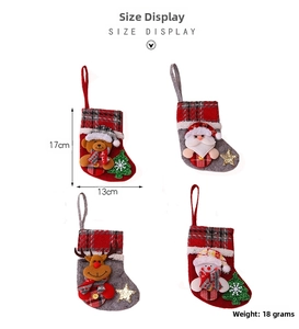 Detailed view of four mini Christmas stockings featuring Santa, Snowman, Deer and Bear