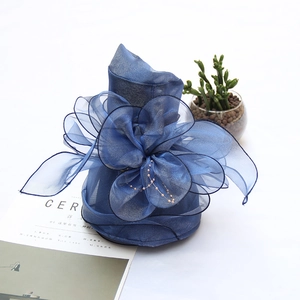 Elegant navy blue organza sun hat featuring a large mesh flower and pearl accents