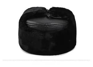 Rear view of a black winter trapper hat with textured leather and thick faux fur lining