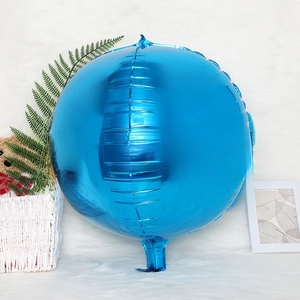 Detail of a shiny metallic blue 4D sphere balloon with mirror finish for party decor
