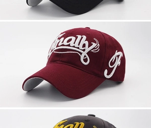 Detail of embroidered Finally letters on burgundy, black and grey cotton baseball caps