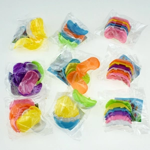 Detailed view of colorful DIY assembly ball puzzle toys in individual plastic bags