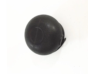 Close-up of a black mini cauldron bucket with textured finish for Halloween candy