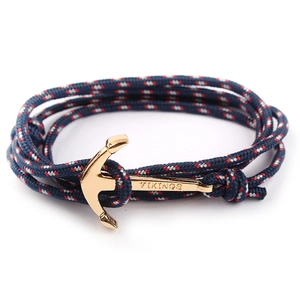 Nautical braided nylon rope bracelet in navy blue with golden Vikings anchor charm