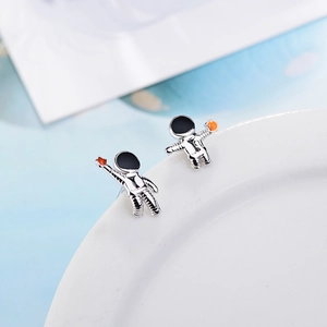 Asymmetric silver astronaut stud earrings with colorful planet charms for women