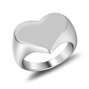 Polished silver heart signet ring made of stainless steel with a minimalist wide band design