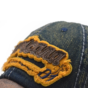 Vintage washed denim baseball cap with premium diamond embroidery and distressed details