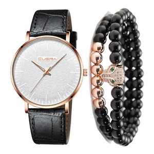 Detail showing square quartz watch with leather strap and a crystal leopard bead bracelet