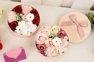 Detailed top view of decorative soap flower round gift boxes with roses and pearls