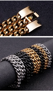 Detail shot of men's Cuban chain bracelets in gold, silver, and black stainless steel