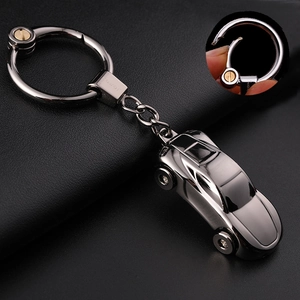 Silver metal car keychain with LED light featuring a realistic automotive pendant design