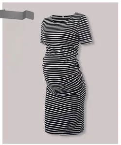 Detail view of striped maternity dress with side ruching for pregnancy comfort