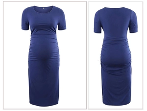 Front and back view of a royal blue short sleeve maternity maxi dress in soft knit fabric