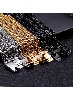 Close-up of wide stainless steel Cuban link chains in gold, silver, and black with box clasp