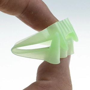 Glow-in-the-dark vampire fangs for Halloween made of flexible soft silicone material