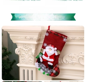 Detailed view of burlap Santa Christmas stocking hanging on mantel, size 31x17x15cm