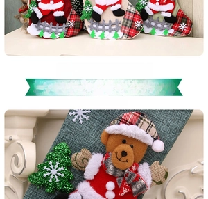 Close-up of 3D Santa and bear applique on linen Christmas stocking with plaid details