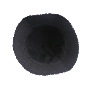 Detail view of the black cotton sun hat interior showing reinforced circular stitching